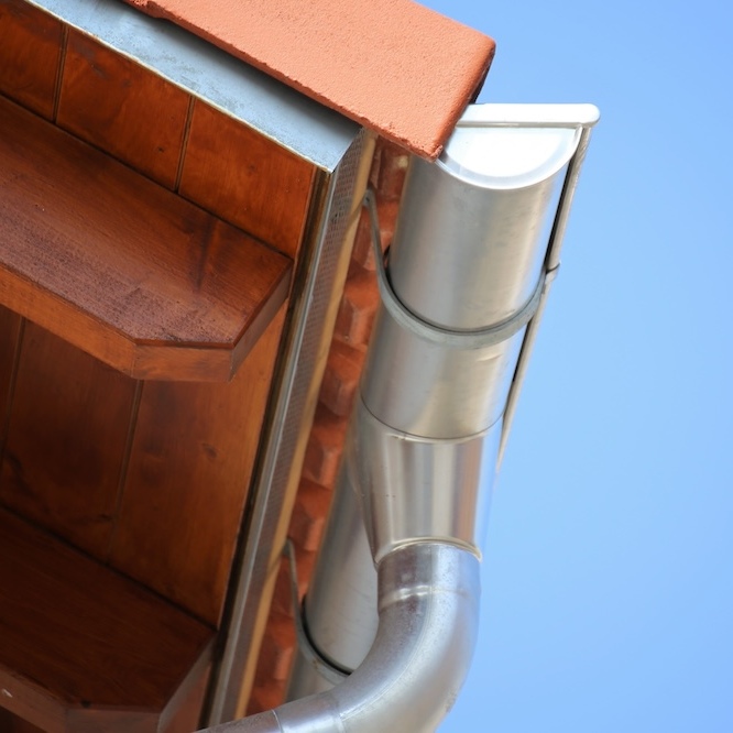 The underside of a roof gutter system.